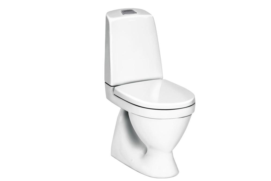 Hvid moderne toilet med lukket låg